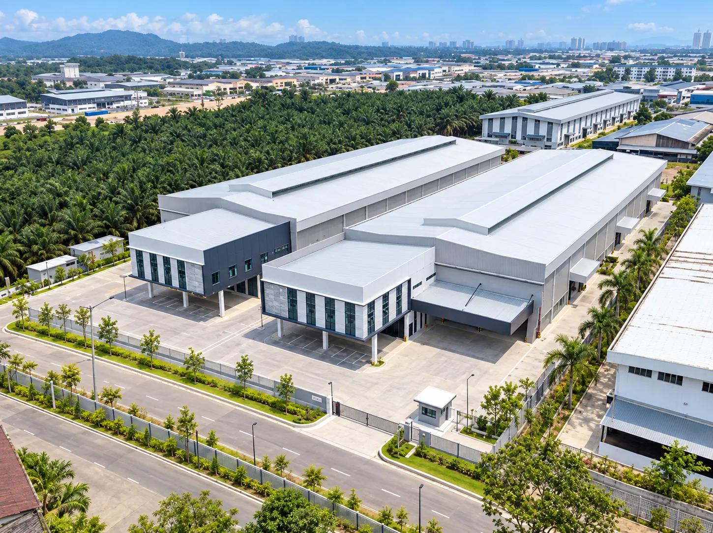 Aerial view of two detached factory buildings for sale in Desa Cemerlang, Johor